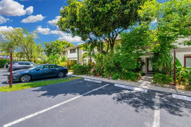 a view of street with parked cars