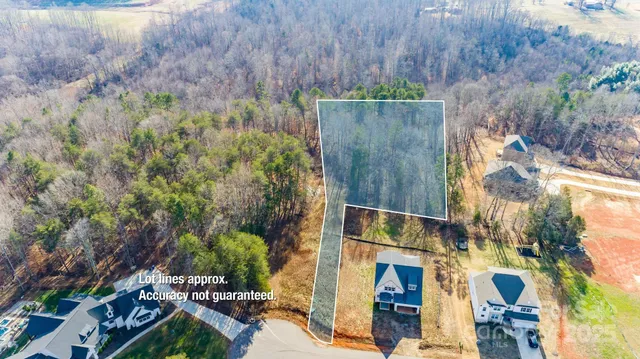 an aerial view of residential house with outdoor space
