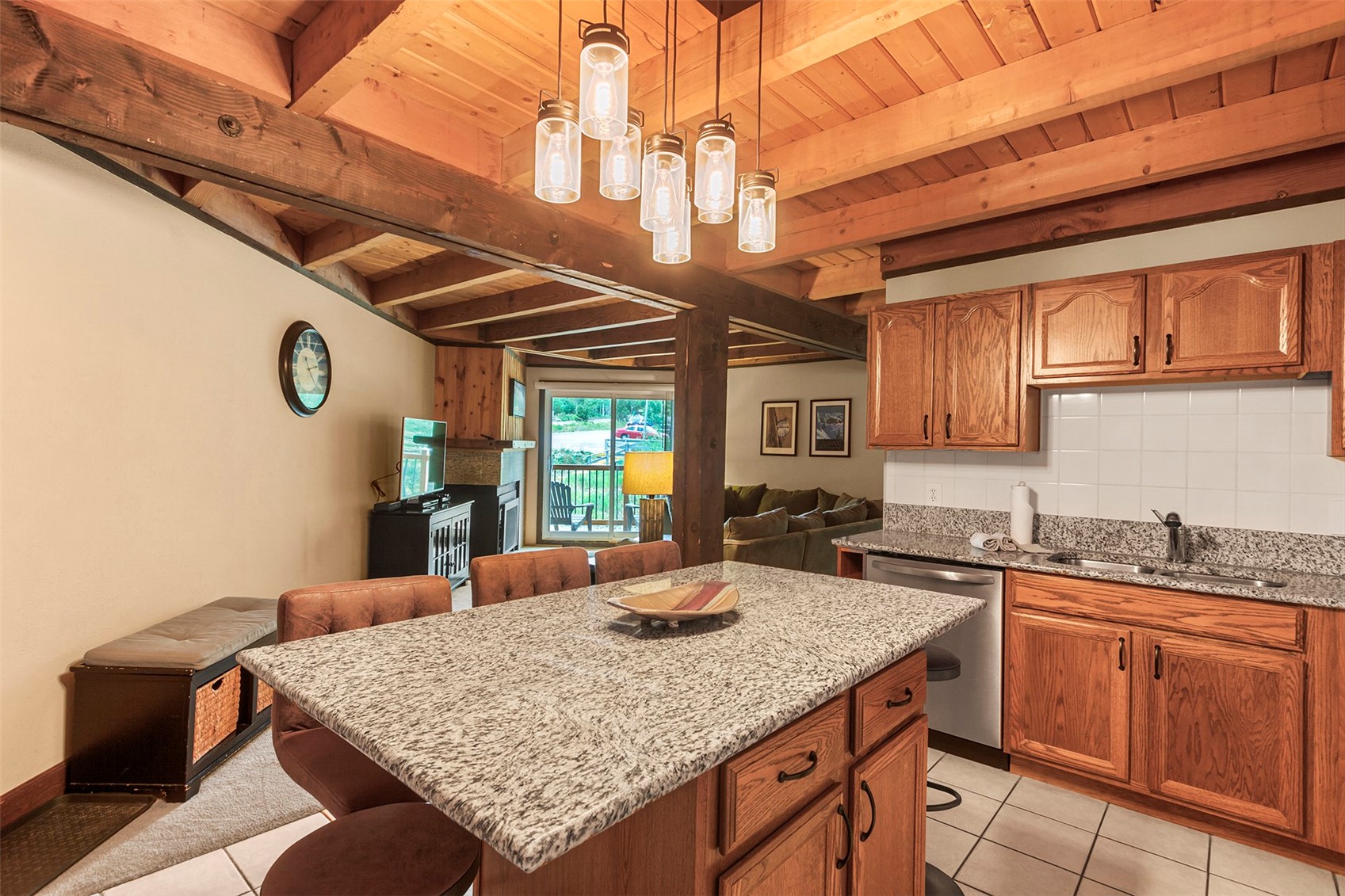 8300 Ryan Gulch Road, Unit 207 Wildernest, CO 80498 - Photo 1 of 2 a kitchen with a sink a counter space cabinets and appliances