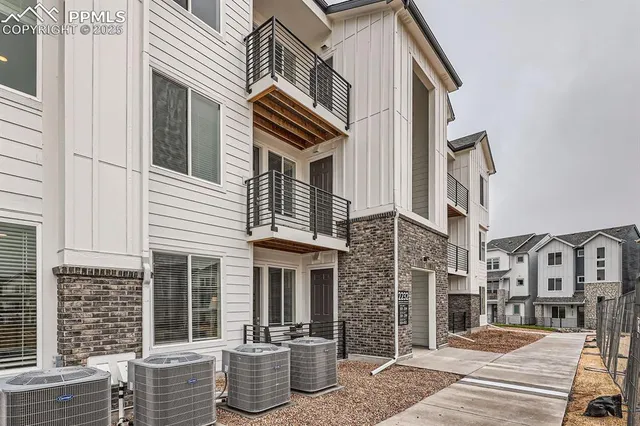 a front view of a house with a barbeque