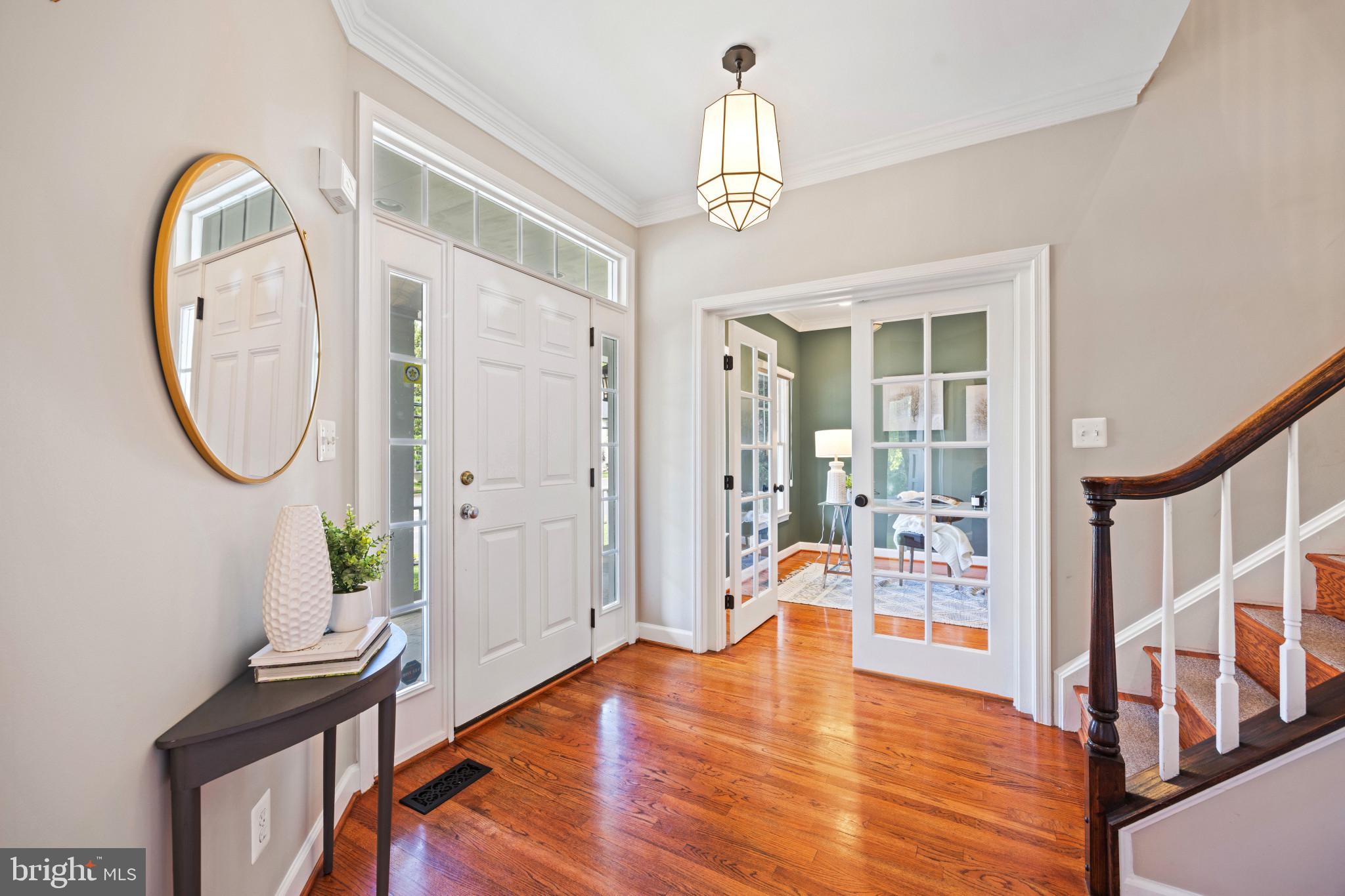 2181 South Glebe Road Arlington, VA 22206 - Photo 4 of 46 Inviting foyer with gleaming hardwood floors