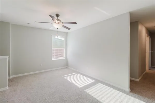 a bedroom with a bed and a closet