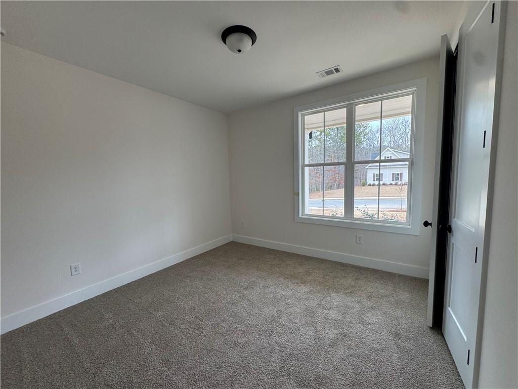 1699 Darby Road Waleska, GA 30183 - Photo 14 of 17 an empty room with a window