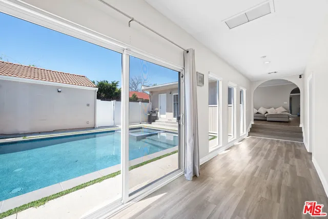 a view of a living room and hardwood floor