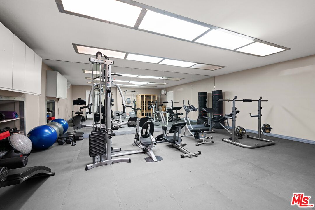 15042 Valleyheart Drive Sherman Oaks, CA 91403 - Photo 26 of 31 a view of a room with gym equipment