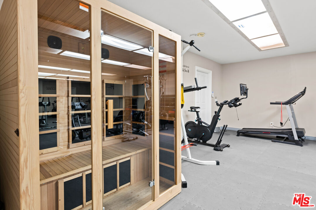 15042 Valleyheart Drive Sherman Oaks, CA 91403 - Photo 27 of 31 a view of a workspace with closet