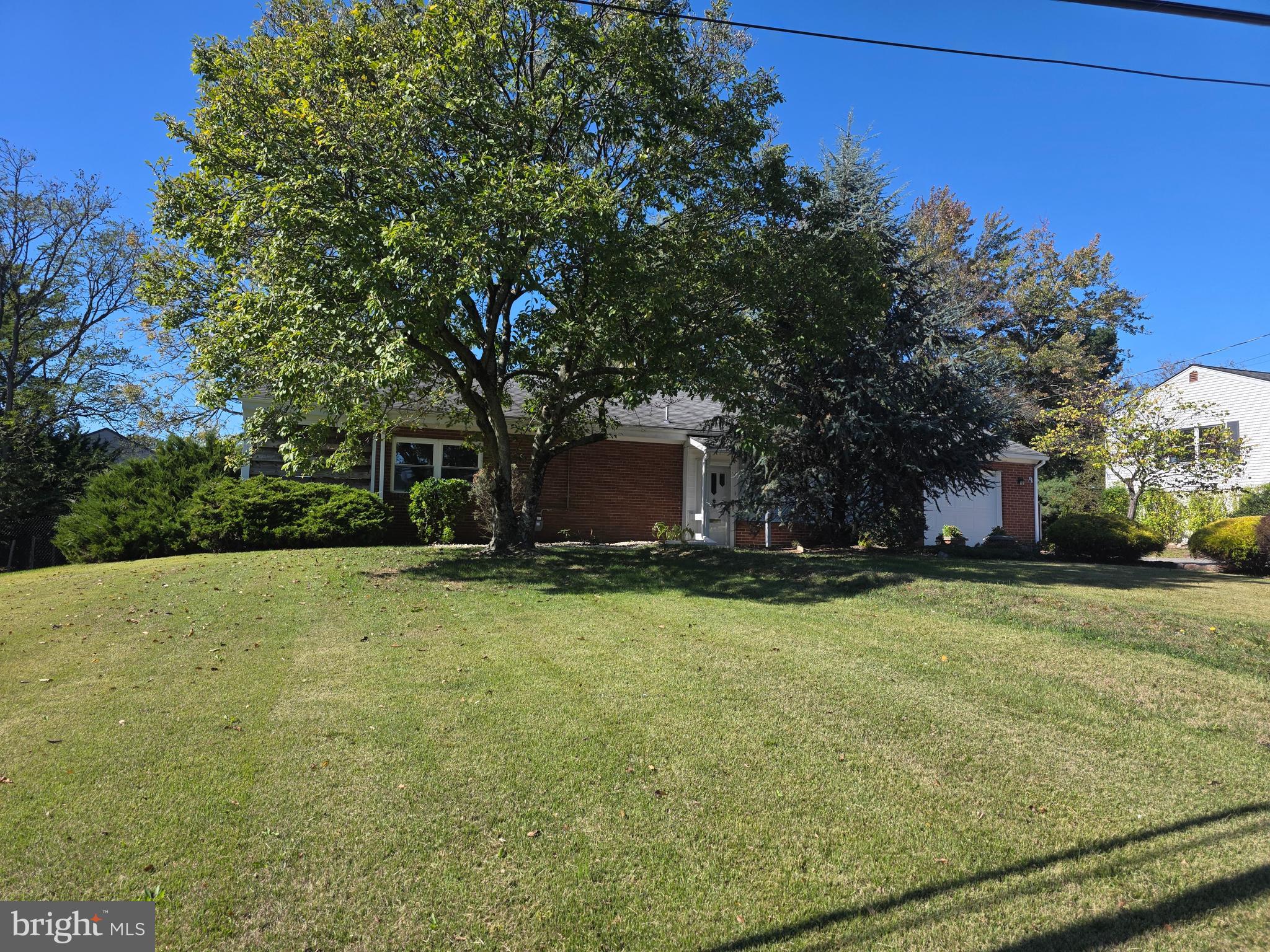 1906 Colonial Road Harrisburg, PA 17112 - Photo 14 of 34 a view of a house with a yard and garage