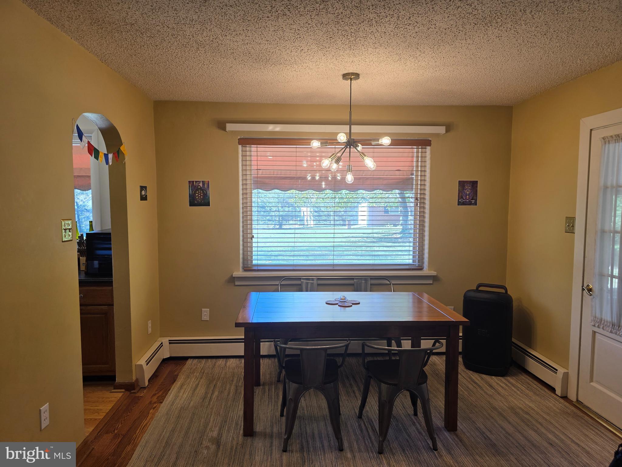 1906 Colonial Road Harrisburg, PA 17112 - Photo 18 of 34 a view of a dining room with furniture and chandelier