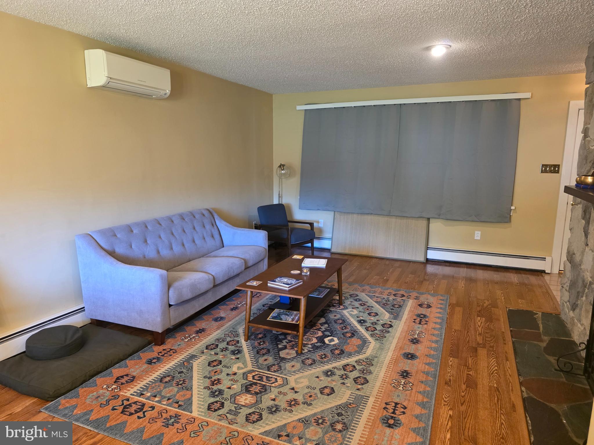 1906 Colonial Road Harrisburg, PA 17112 - Photo 4 of 34 a living room with furniture and a rug