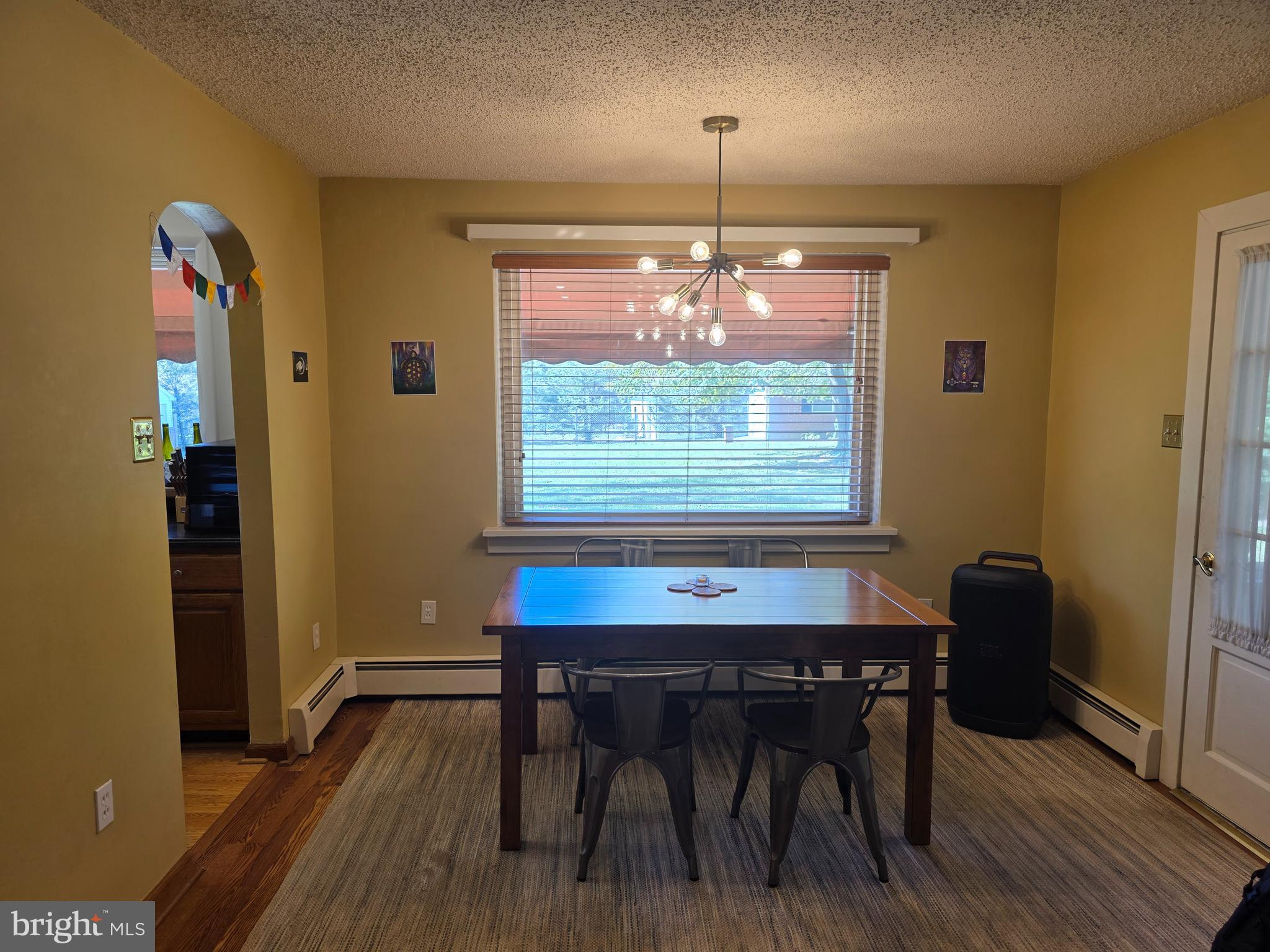 1906 Colonial Road Harrisburg, PA 17112 - Photo 6 of 34 a view of a dining room with furniture wooden floor and chandelier