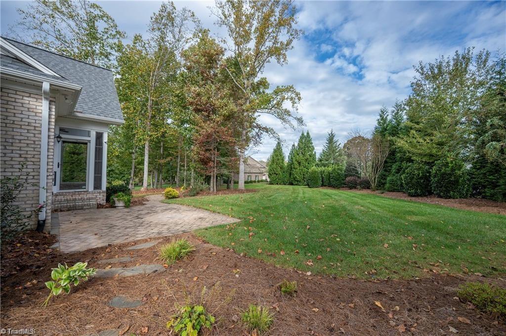 1953 Woodstock Road Clemmons, NC 27012 - Photo 30 of 43 Patio and Backyard