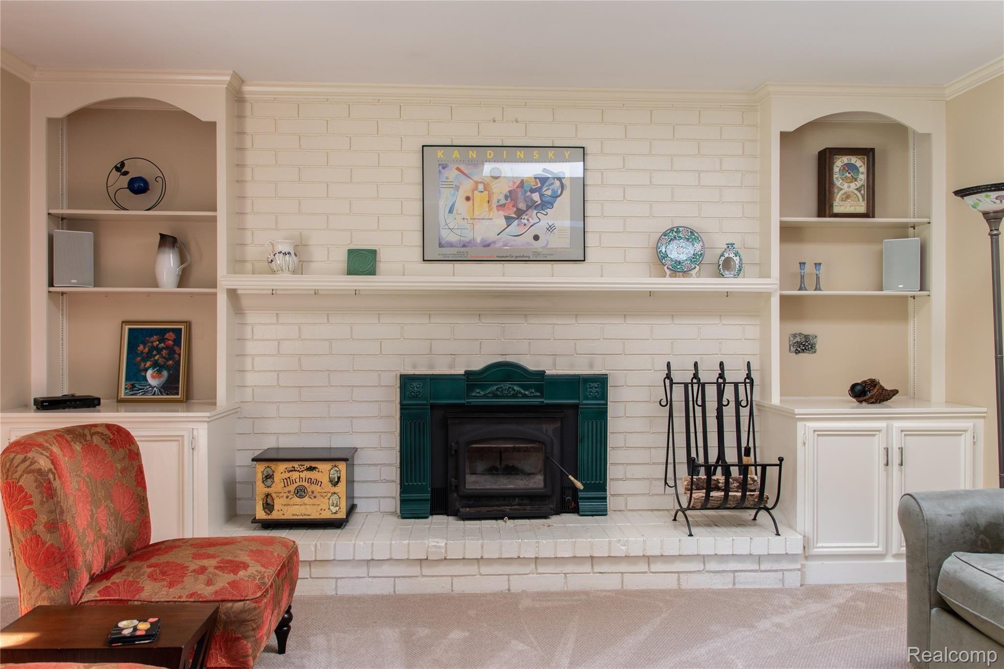 2275 Chalet Drive Rochester, MI 48309 - Photo 17 of 62 Family Room Fireplace and Mantel w/Built-in Bookshelves