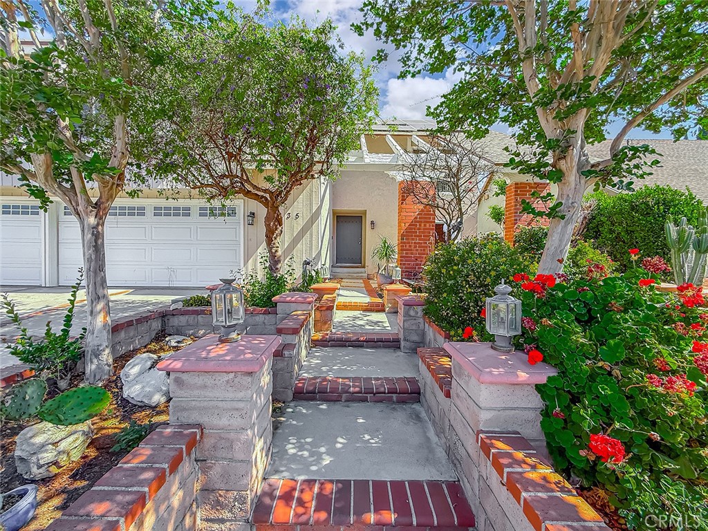 2235 Burnside Street Simi Valley, CA 93065 - Photo 10 of 71 a front view of a house with a yard