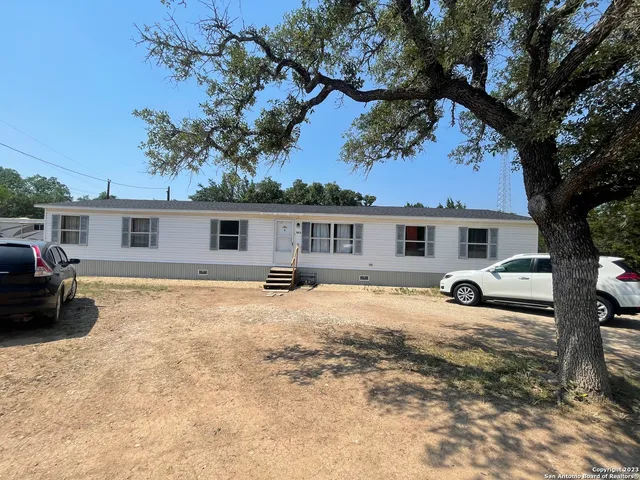 a view of a house with a patio