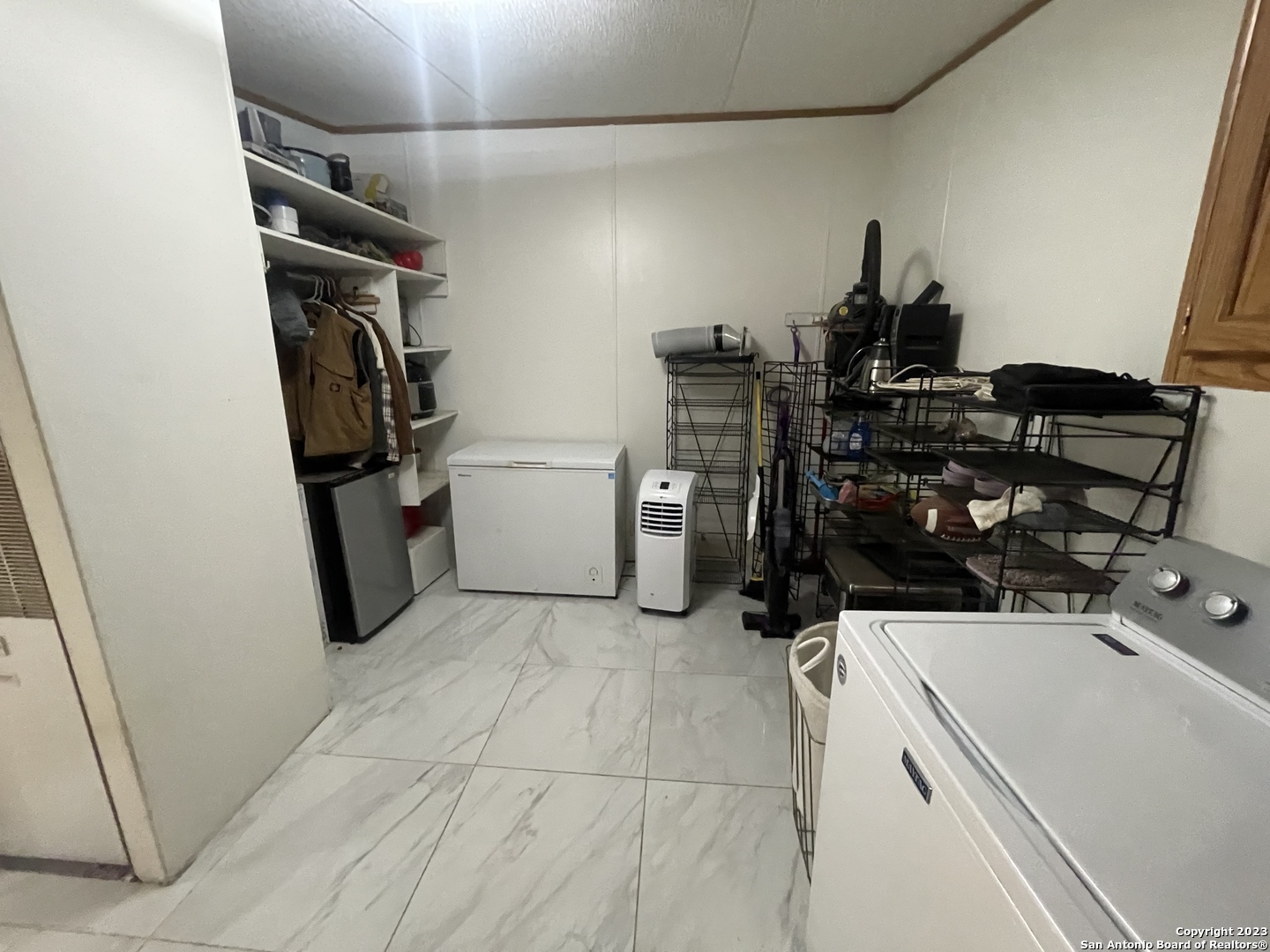 792 Alamo Beach Road, Unit A Pipe Creek, TX 78063 - Photo 10 of 18 a room with storage and utility