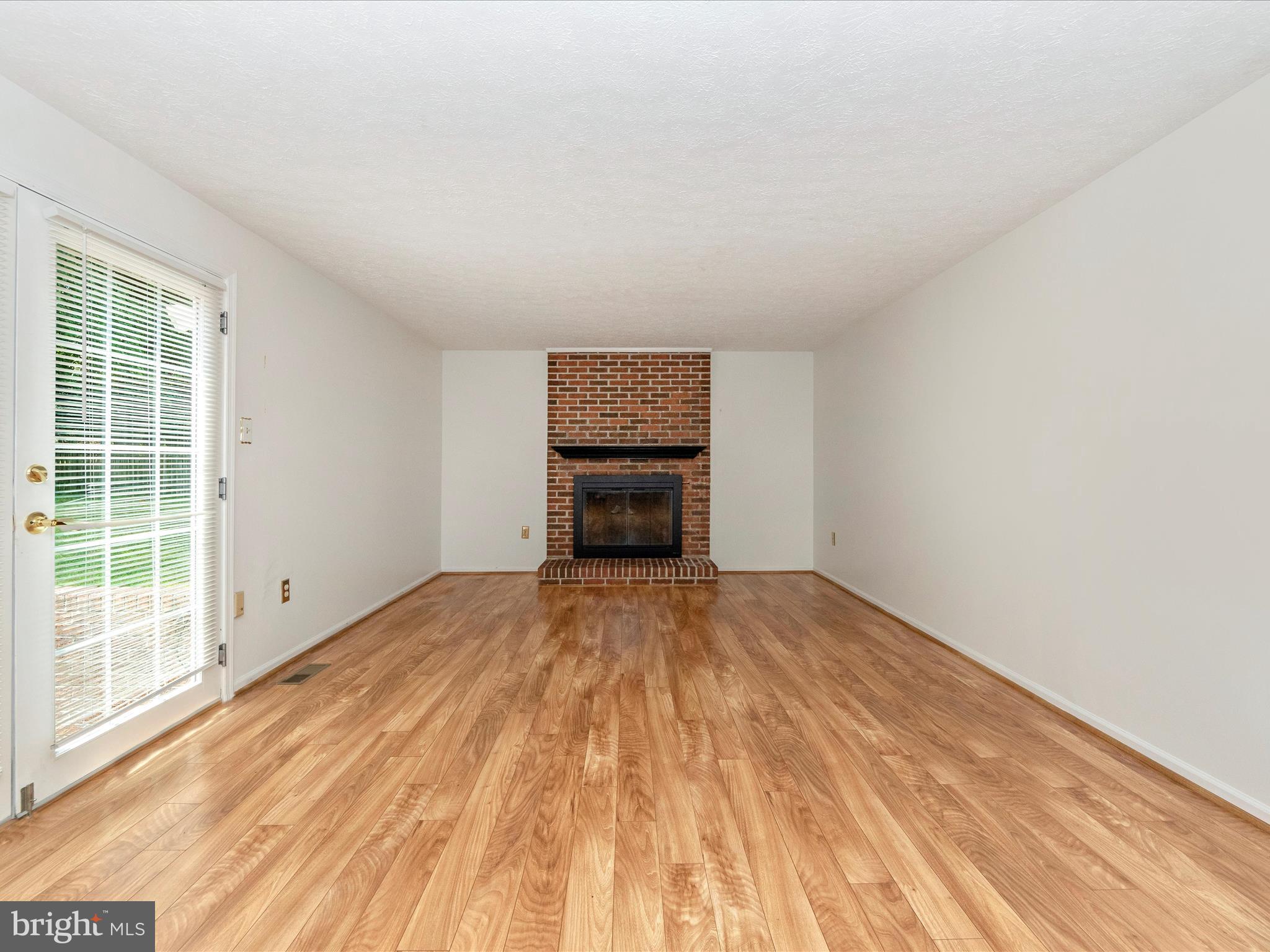 1127 Netherlands Court Silver Spring, MD 20905 - Photo 19 of 53 FAMILY ROOM WITH F/P