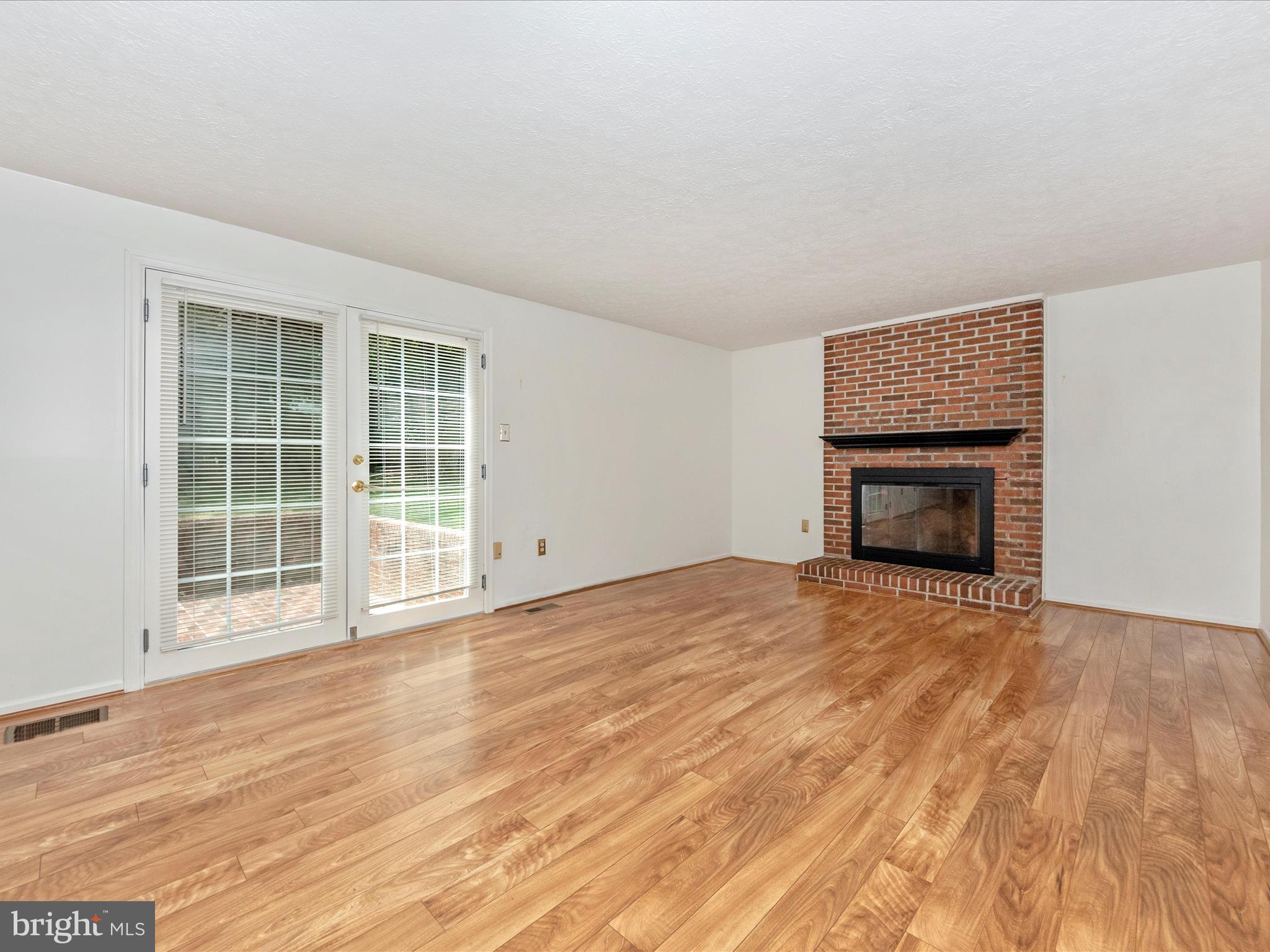 1127 Netherlands Court Silver Spring, MD 20905 - Photo 20 of 53 FAMILY ROOM WITH F/P