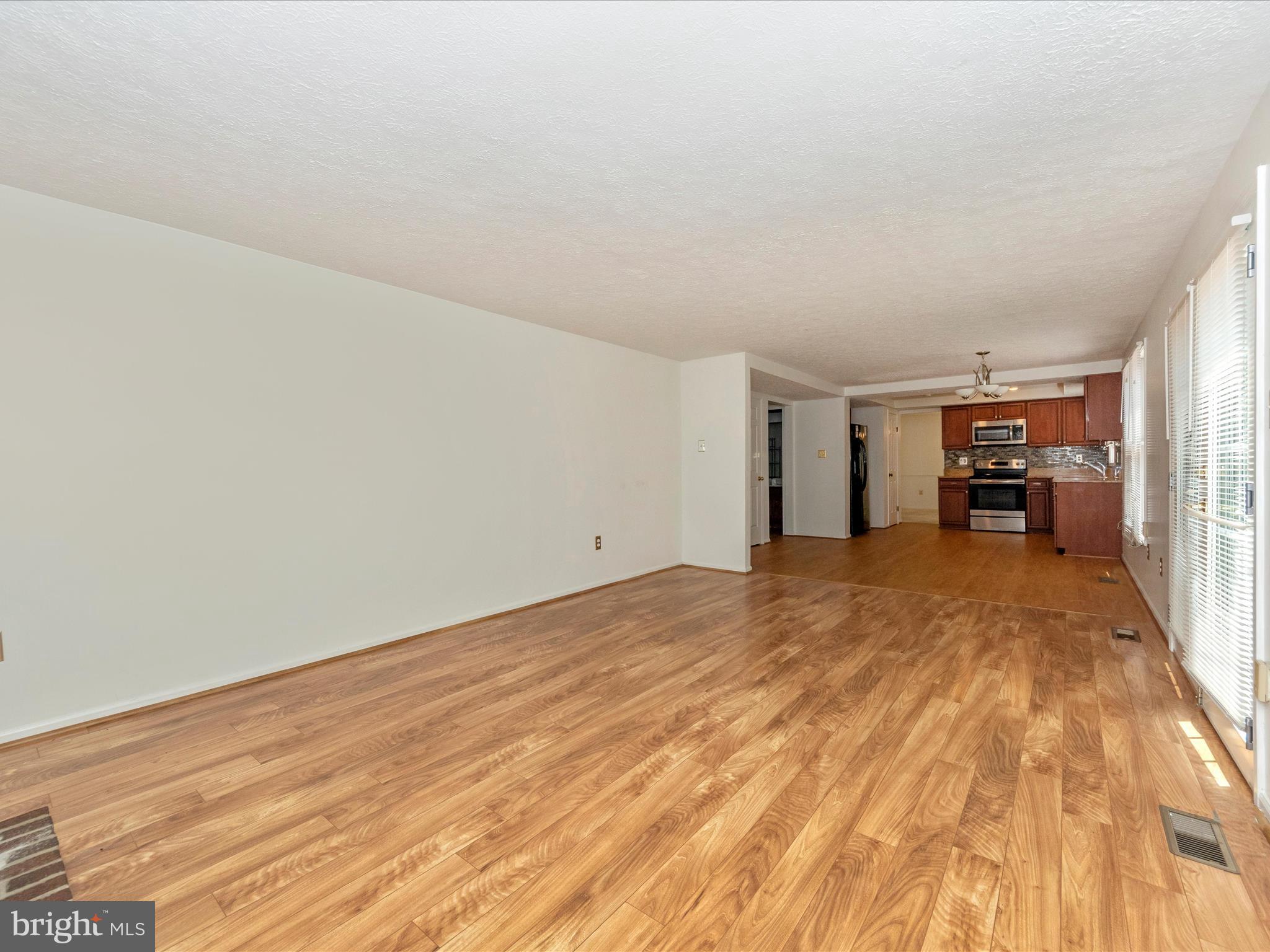 1127 Netherlands Court Silver Spring, MD 20905 - Photo 22 of 53 FAMILY ROOM WITH F/P