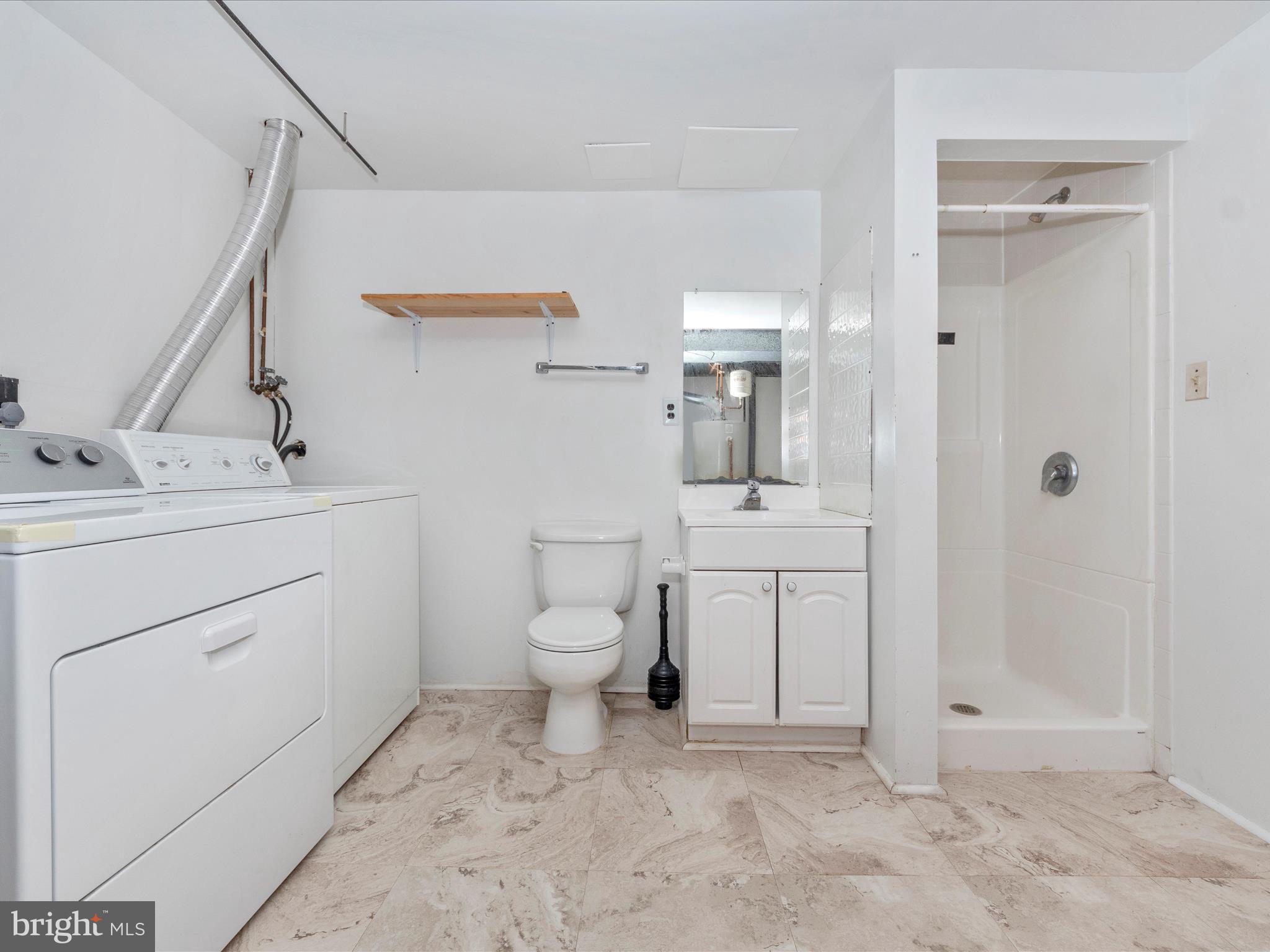1127 Netherlands Court Silver Spring, MD 20905 - Photo 43 of 53 LOWER LEVEL BATH & WASHER/DRYER