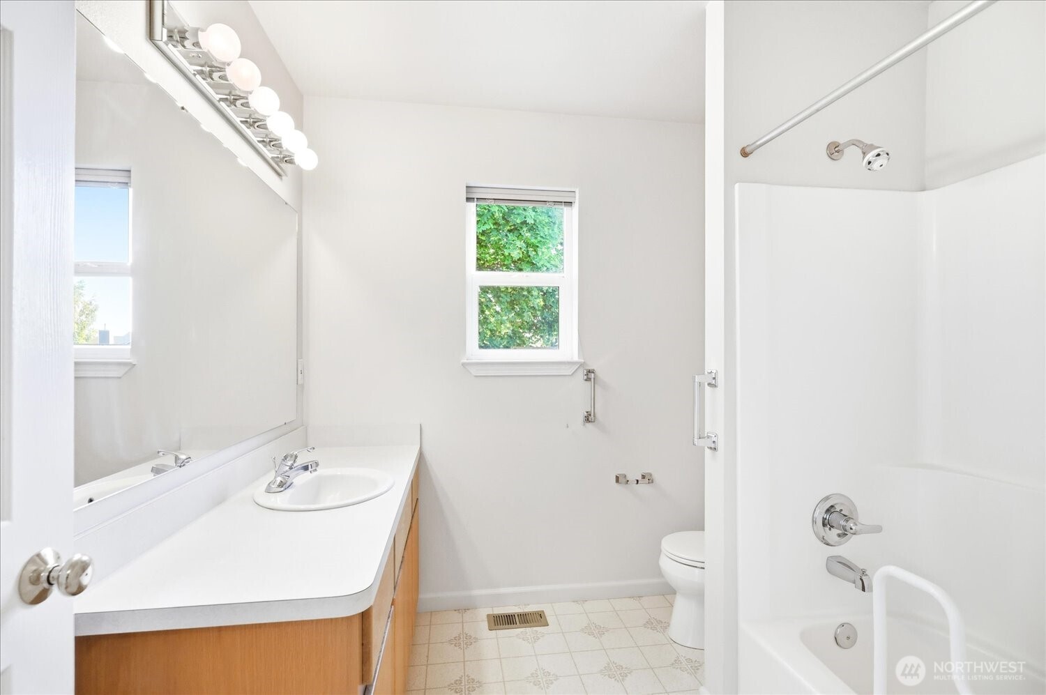 221 Shane Porter Road Walla Walla, WA 99362 - Photo 14 of 38 a bathroom with a sink a toilet and shower curtain