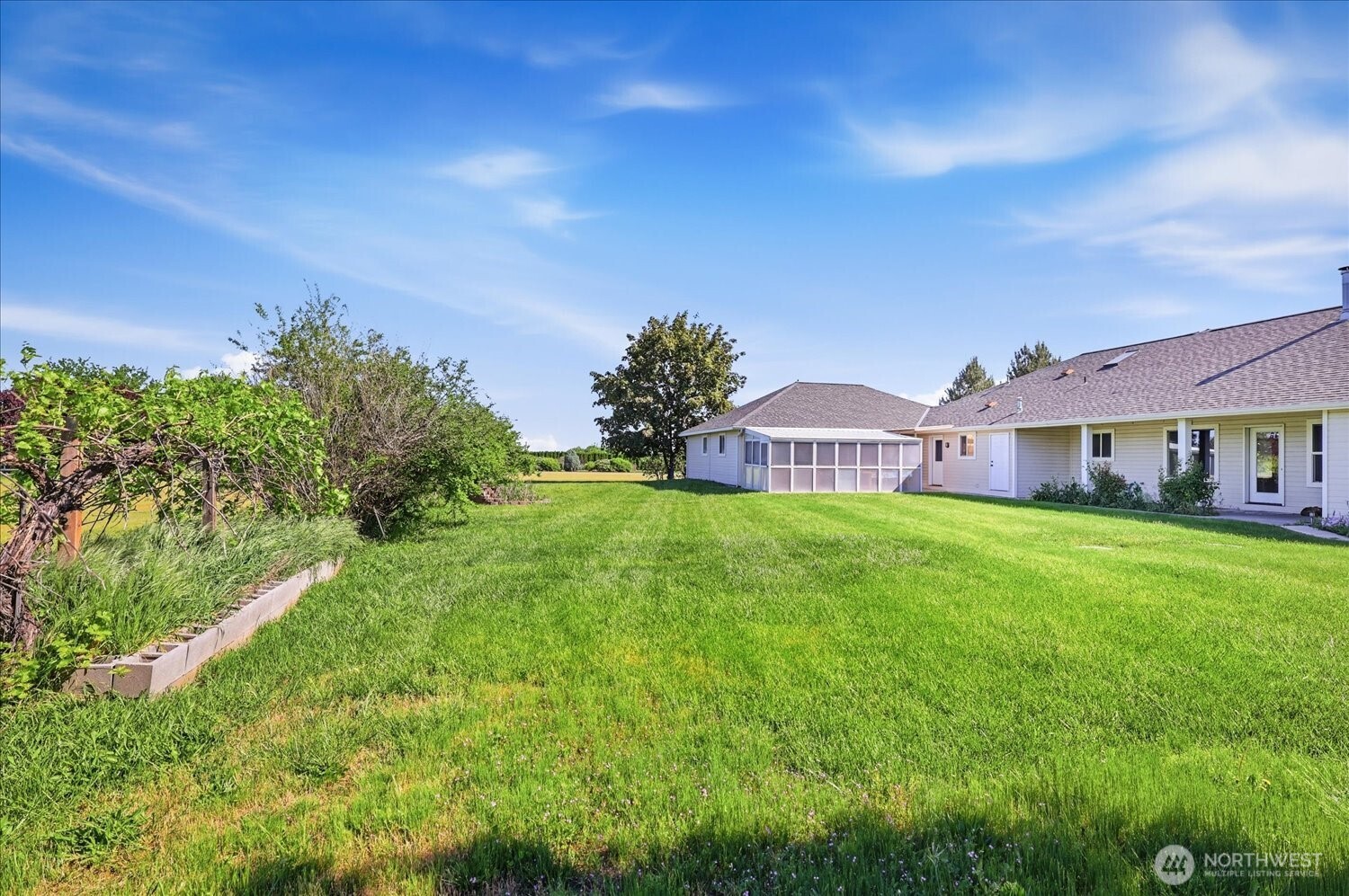 221 Shane Porter Road Walla Walla, WA 99362 - Photo 32 of 38 a view of a house with a big yard