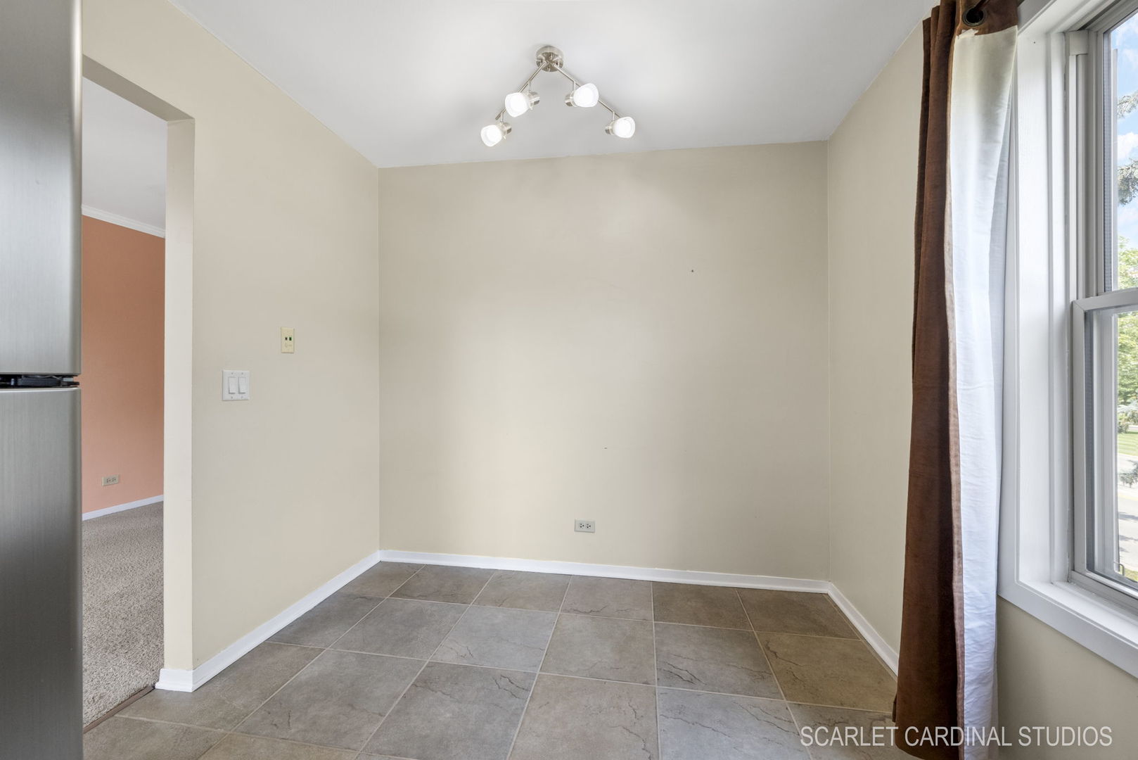 1300 McDowell Road, Unit 203 Naperville, IL 60563 - Photo 14 of 21 a view of an empty room with a window