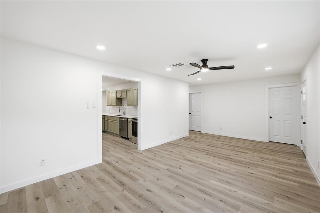 1221 Chestnut Street Waco, TX 76704 - Photo 7 of 32 a view of empty room with wooden floor
