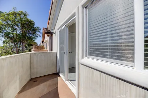 a view of a balcony with window