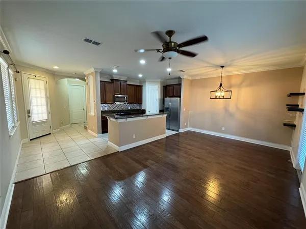 a view of a kitchen with a sink and a stove top oven