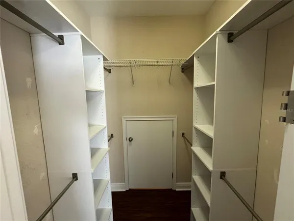 a bathroom with a glass door shower