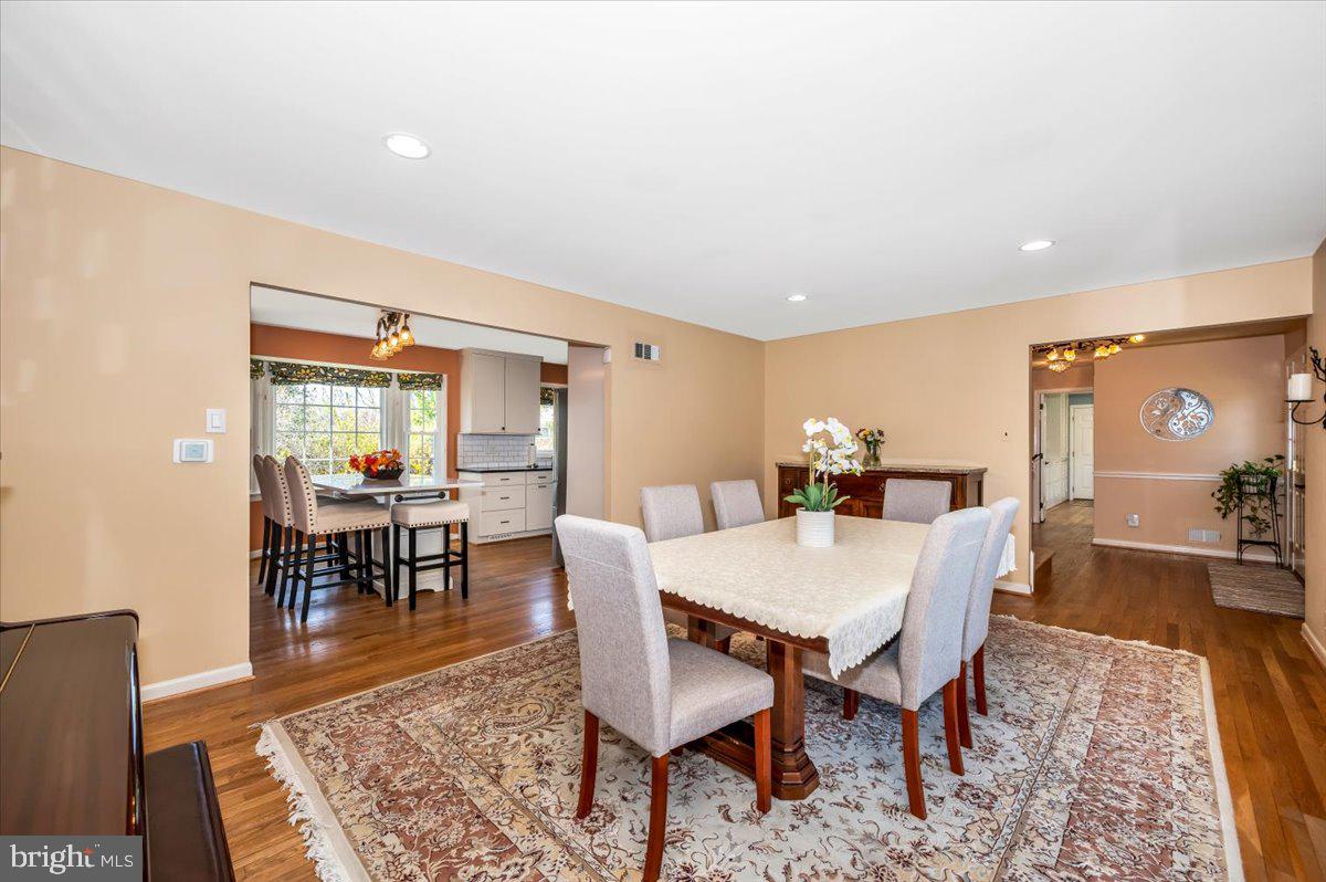 8803 Postoak Road Potomac, MD 20854 - Photo 11 of 66 a view of a dining room with furniture