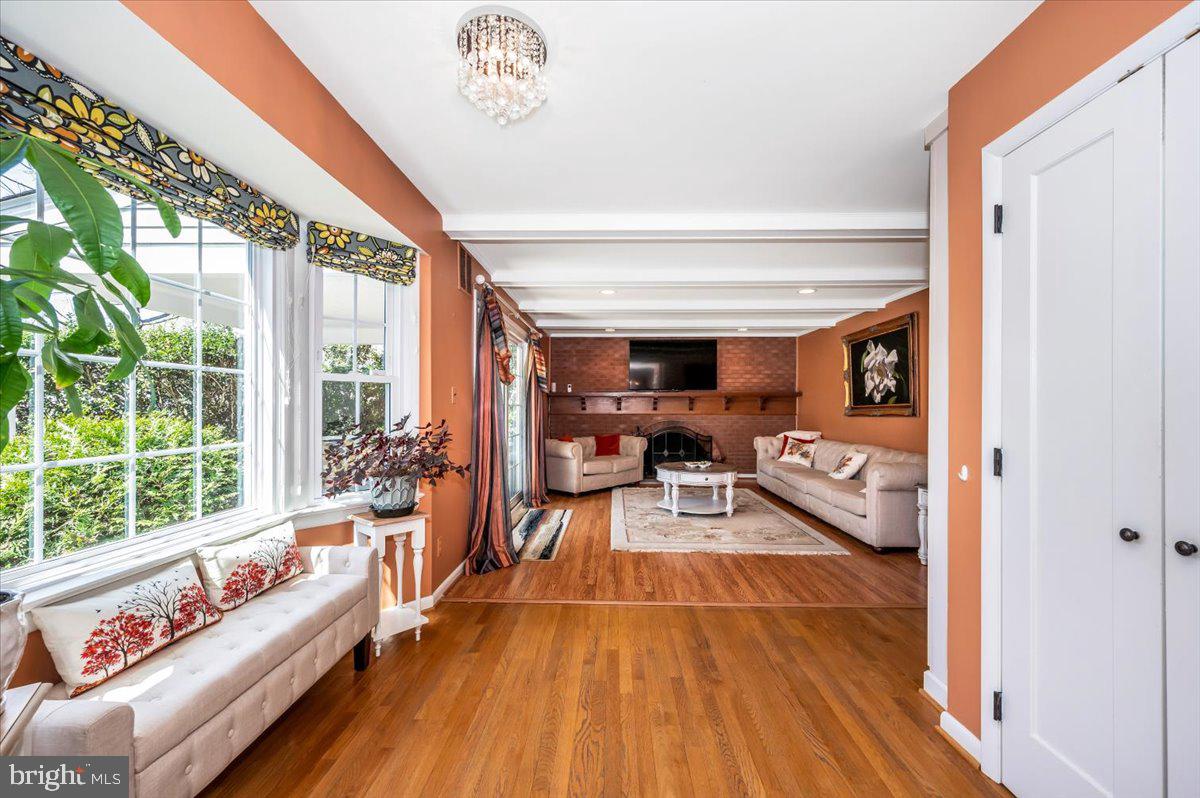 8803 Postoak Road Potomac, MD 20854 - Photo 22 of 66 a living room with furniture and a large window