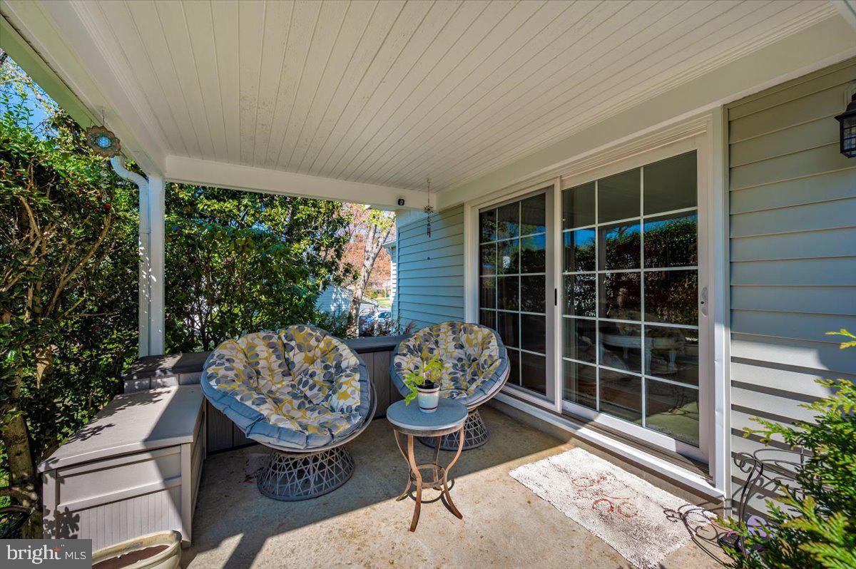 8803 Postoak Road Potomac, MD 20854 - Photo 55 of 66 a front view of a house with garden