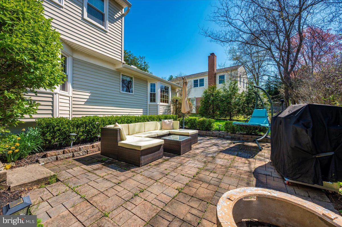 8803 Postoak Road Potomac, MD 20854 - Photo 57 of 66 a backyard of a house with seating space