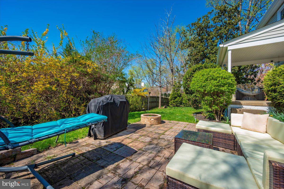 8803 Postoak Road Potomac, MD 20854 - Photo 58 of 66 a view of a bench in a garden