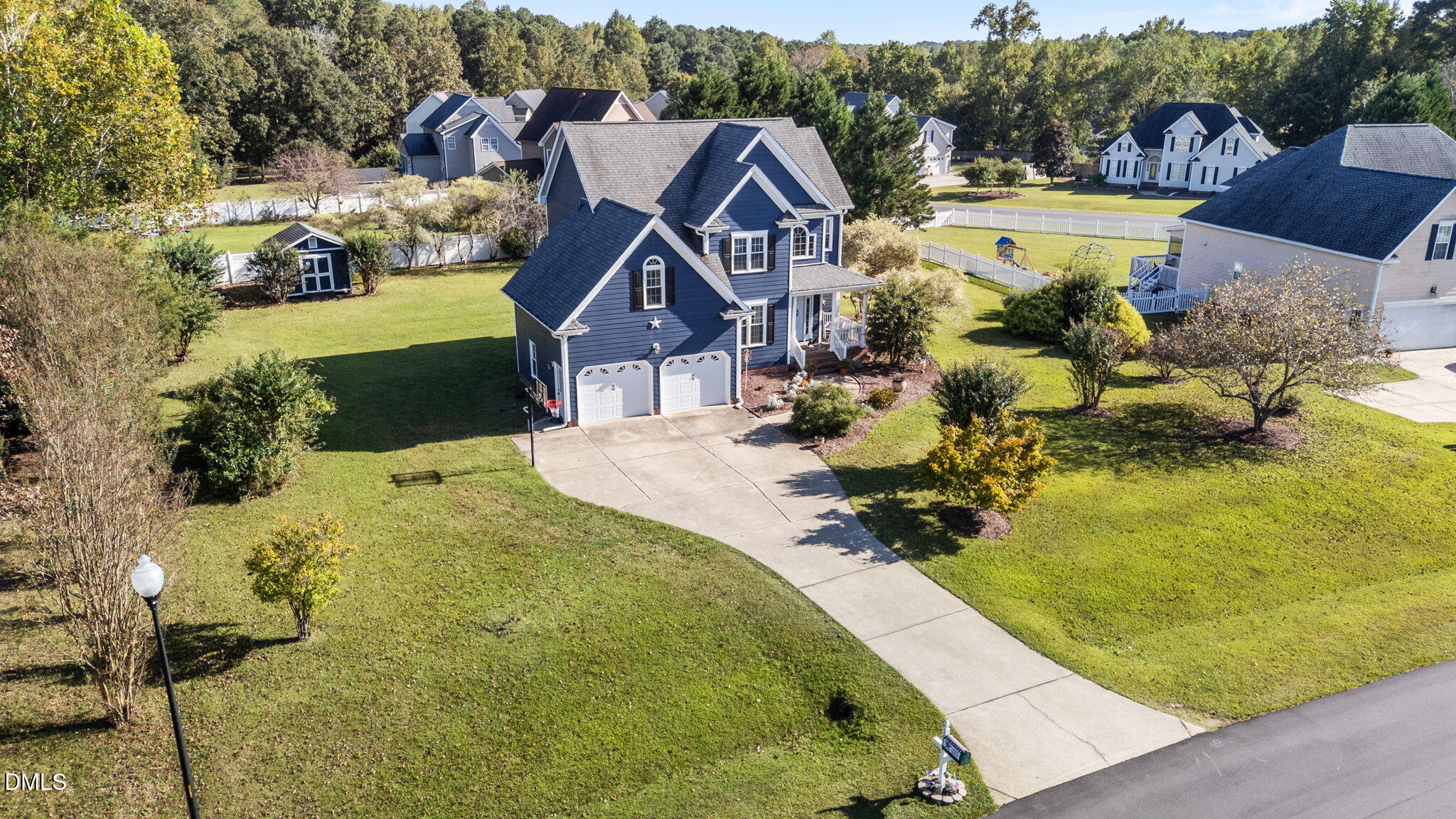1617 Kendall Hill Road Willow Spring, NC 27592 - Photo 11 of 58 a view of a swimming pool with a yard