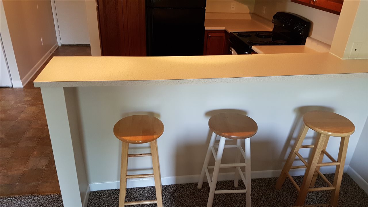 1330 Hunters Road, Unit H Harrisonburg, VA 22801 - Photo 11 of 22 a kitchen with a table and chairs in it