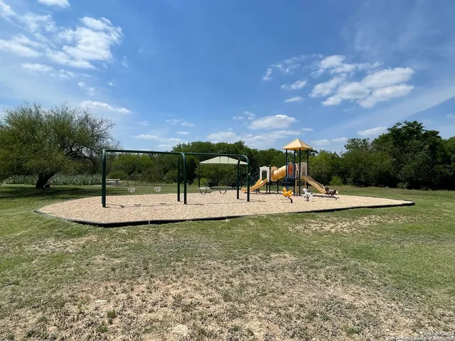 a view of a garden and lake