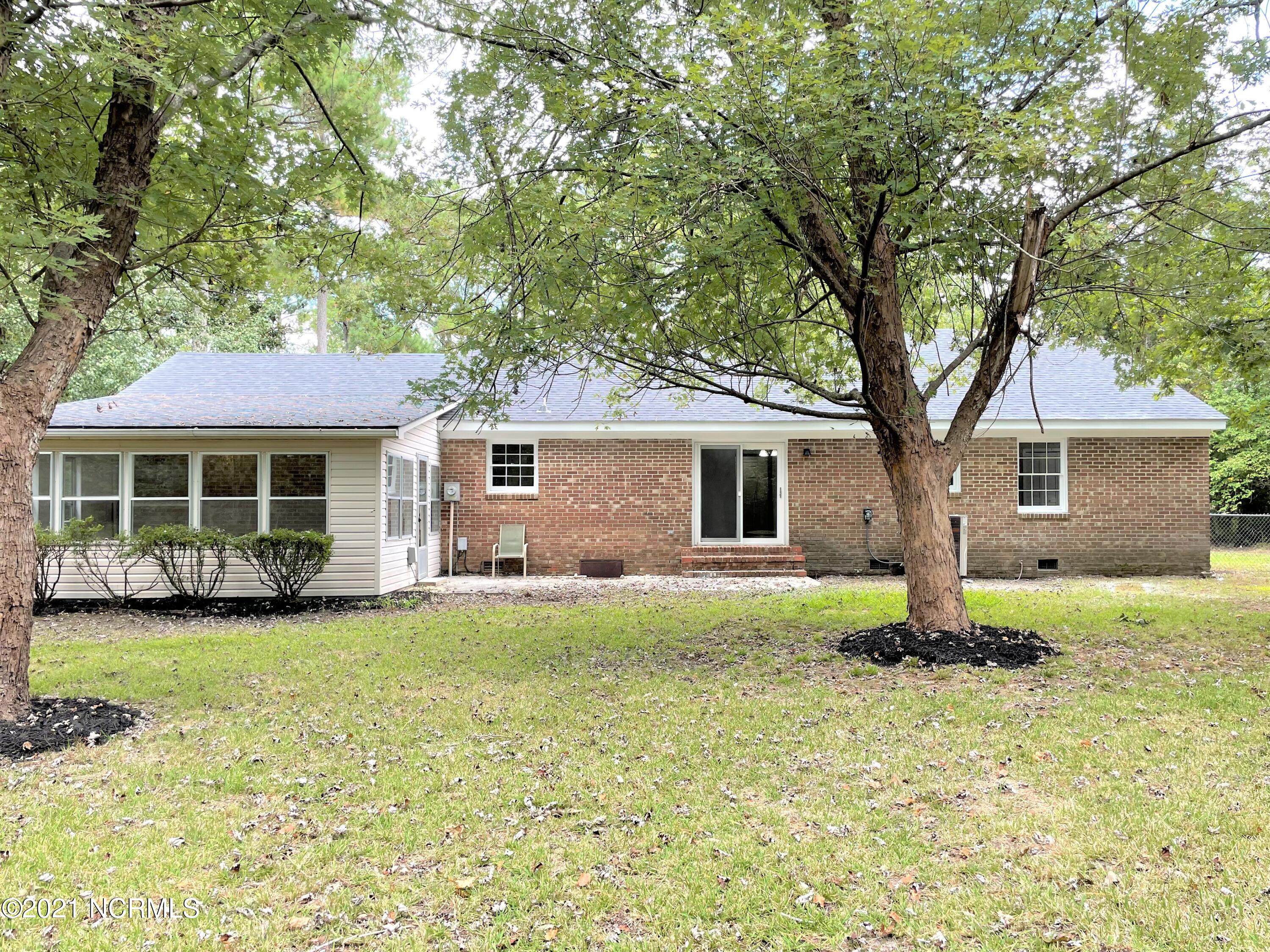 1285 Old Maplehurst Road Jacksonville, NC 28540 - Photo 29 of 32 backyard 1