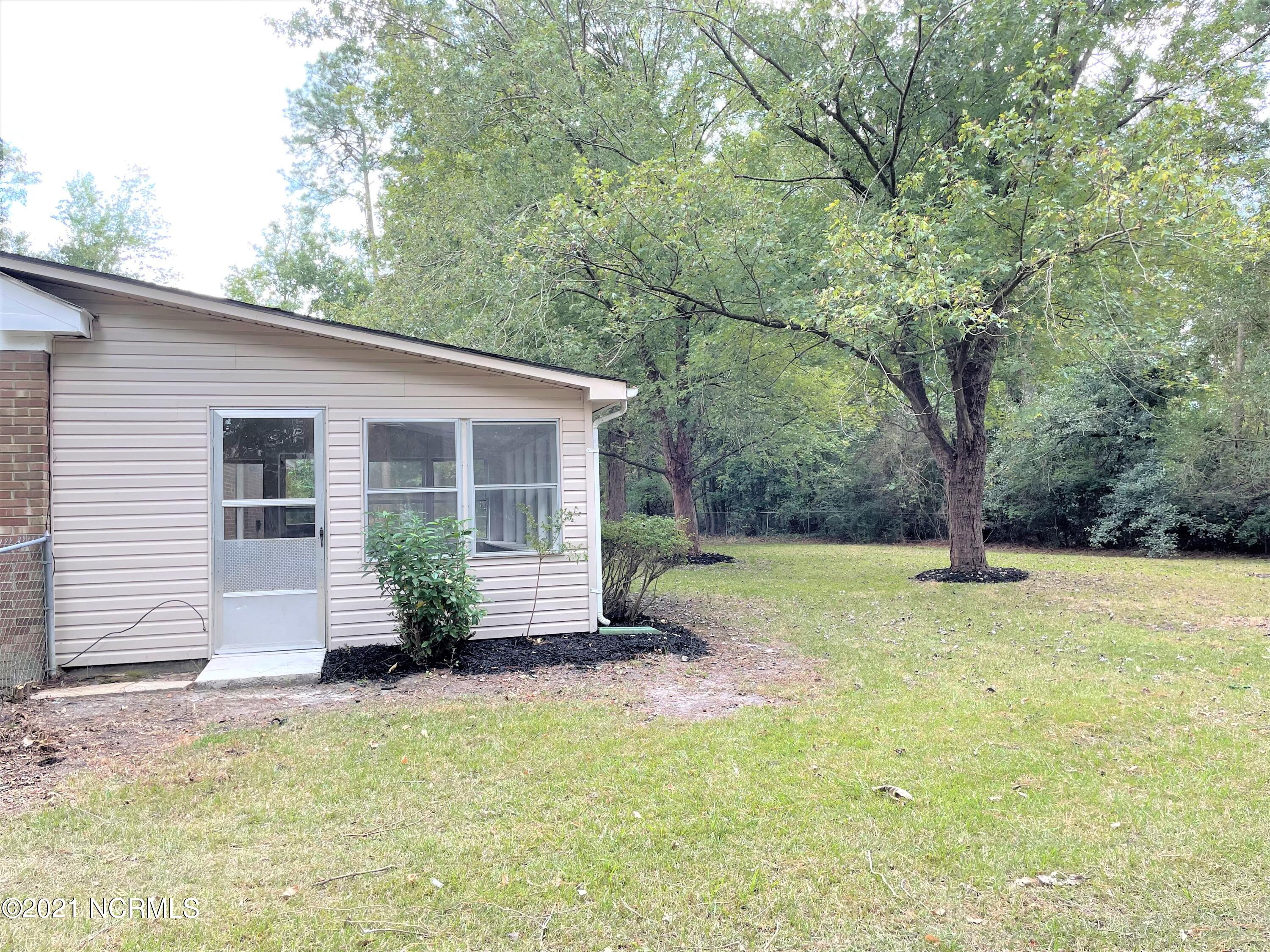 1285 Old Maplehurst Road Jacksonville, NC 28540 - Photo 32 of 32 ext sunroom