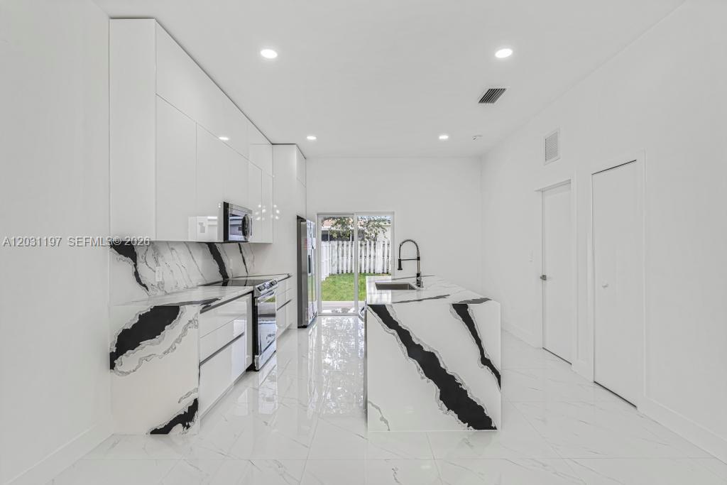 2419 Northwest 97th Street, Unit B Miami, FL 33147 - Photo 3 of 19