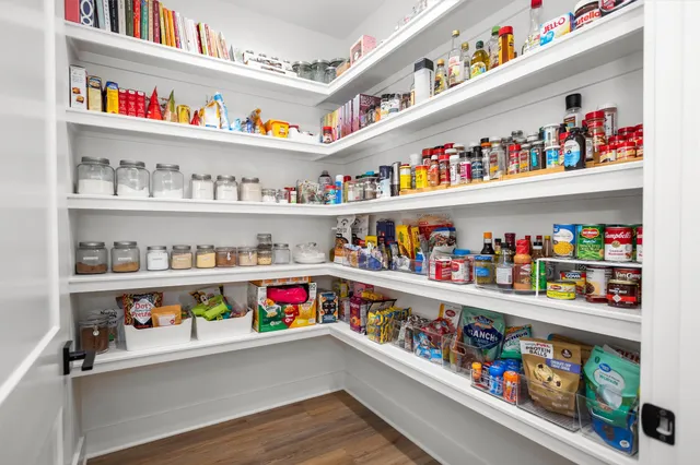 a room with lots of different kinds of food