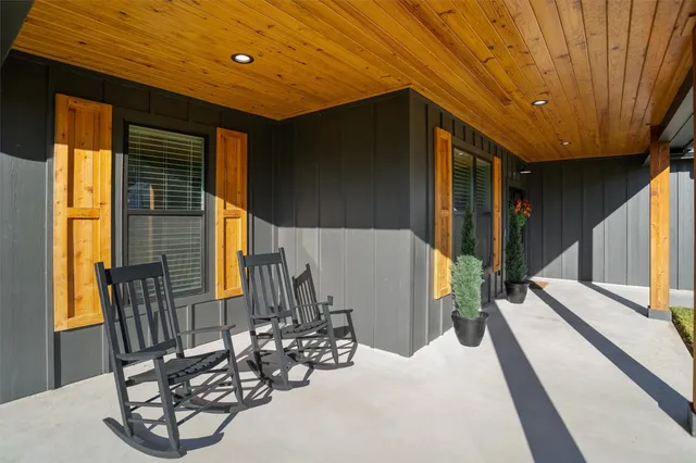 a view of a livingroom with furniture and window
