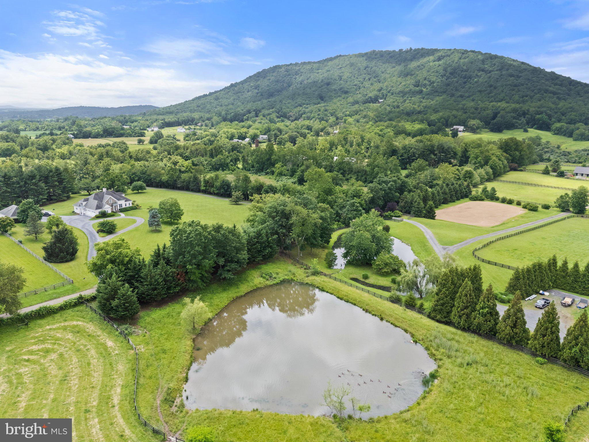 10674 Ada Road Marshall, VA 20115 - Photo 11 of 35 a view of a swimming pool with a yard