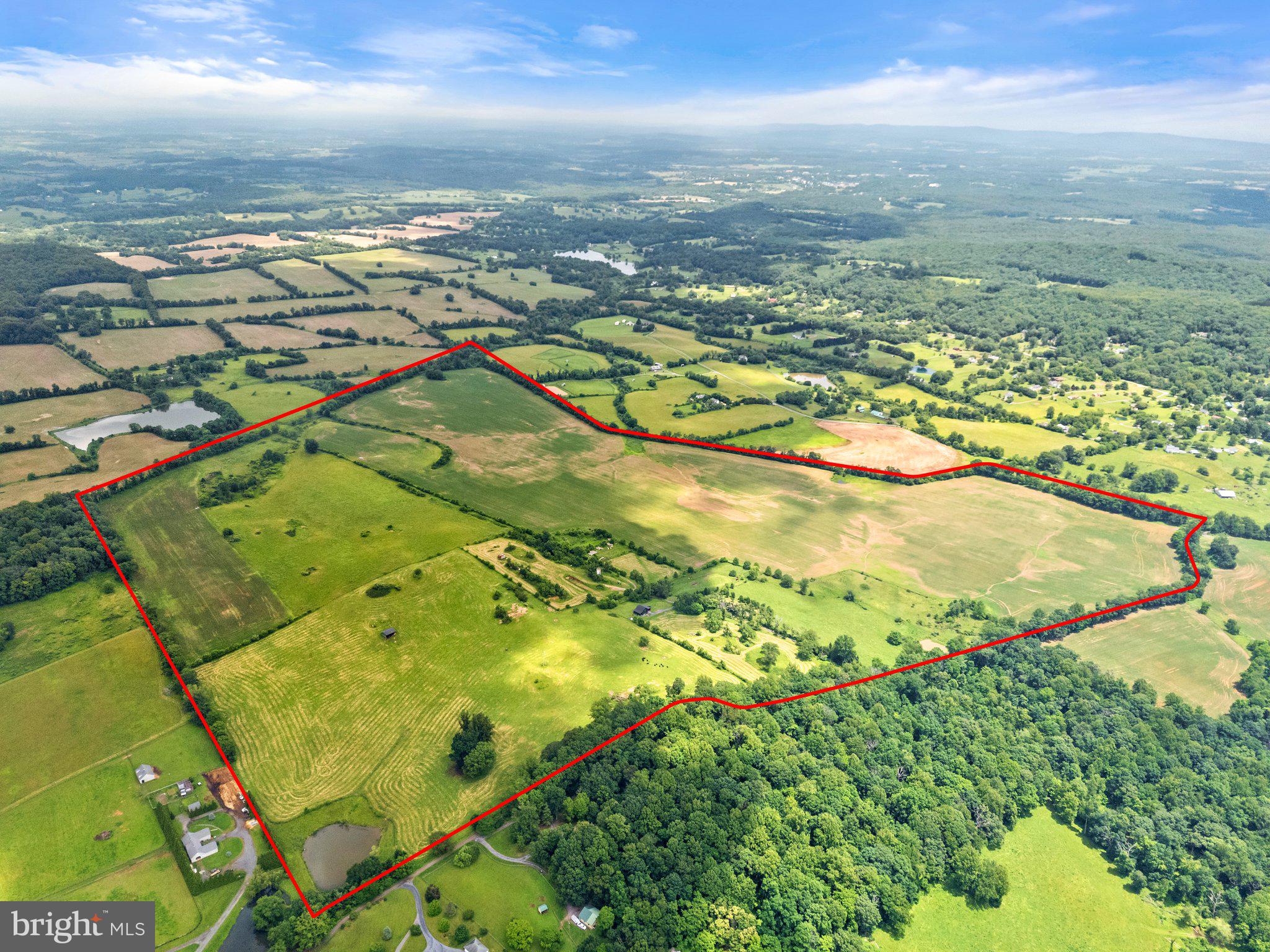 10674 Ada Road Marshall, VA 20115 - Photo 32 of 35 an aerial view of residential houses with outdoor space