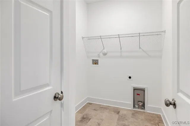 a spacious bedroom with a bed and a window