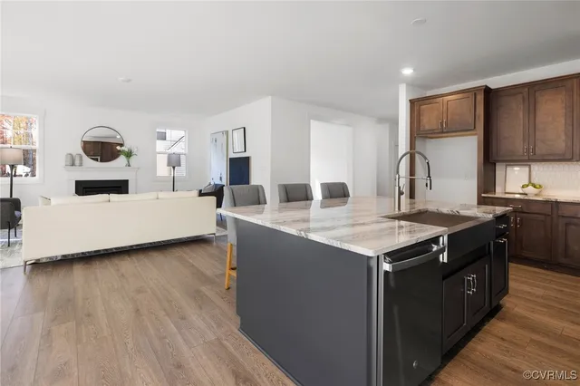 a kitchen with a stove and a sink