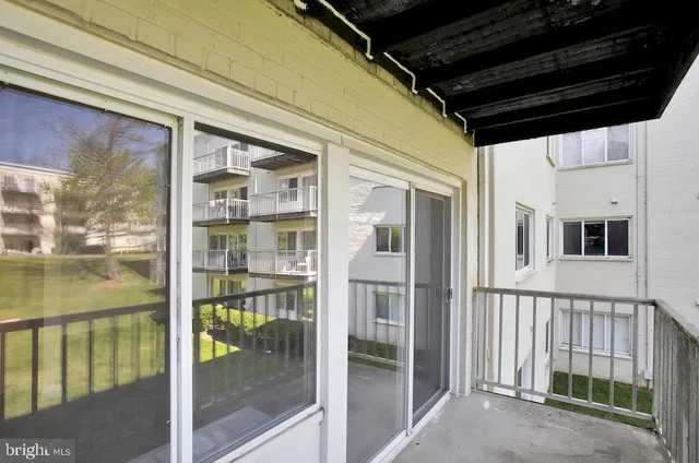 a view of a building from a balcony