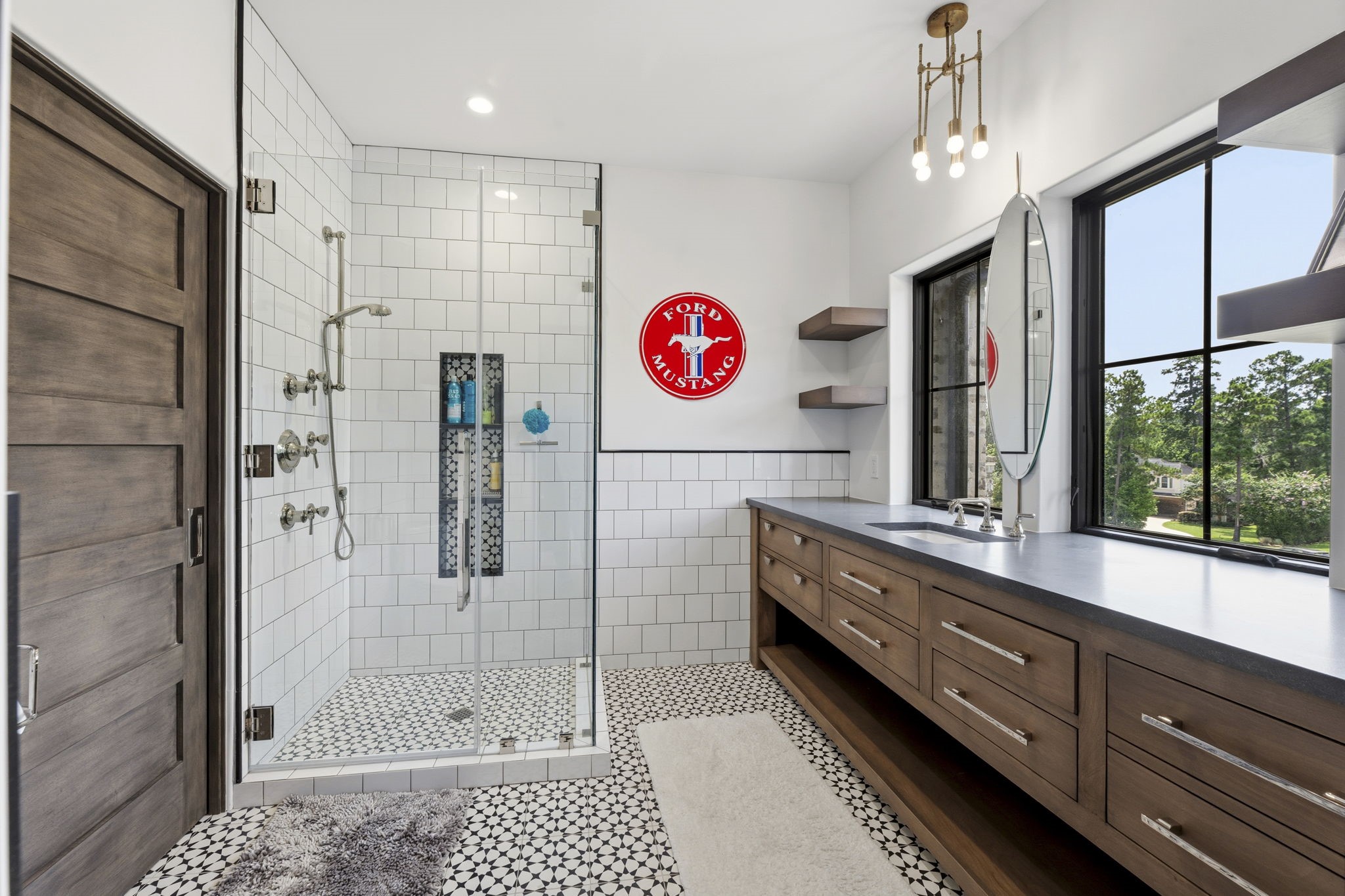27006 Star Gazer Way Spring, TX 77386 - Photo 39 of 50 A luxurious ensuite bathroom featuring a spacious shower with body sprayers, elevated finishes, and a private retreat designed for everyday comfort.