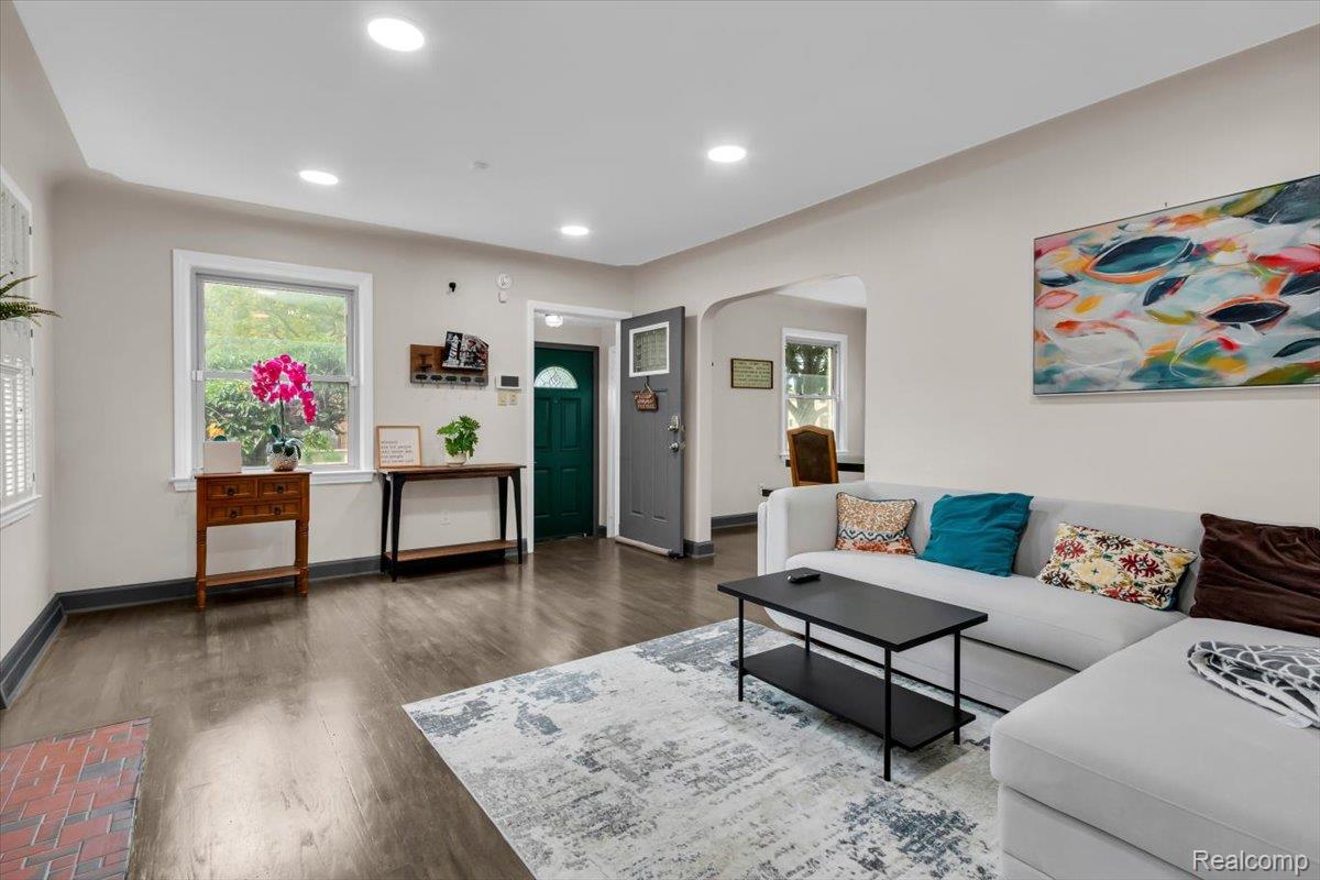 476 Touraine Road Grosse Pointe, MI 48236 - Photo 4 of 30 Recessed lighting illuminates the living area, featuring wood-finish flooring and light-toned walls